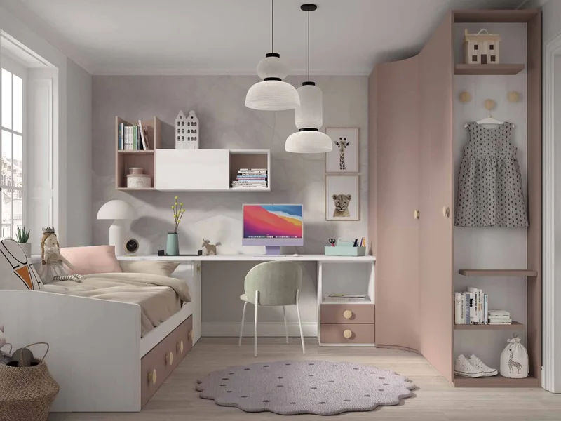 Habitación infantil en tonos rosa y blanco, con cama nido, escritorio y armario rinconero.