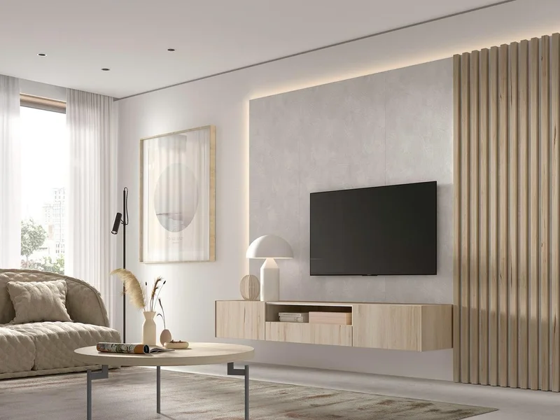 Salón con mueble de televisión suspendido en madera clara y panel de listones.